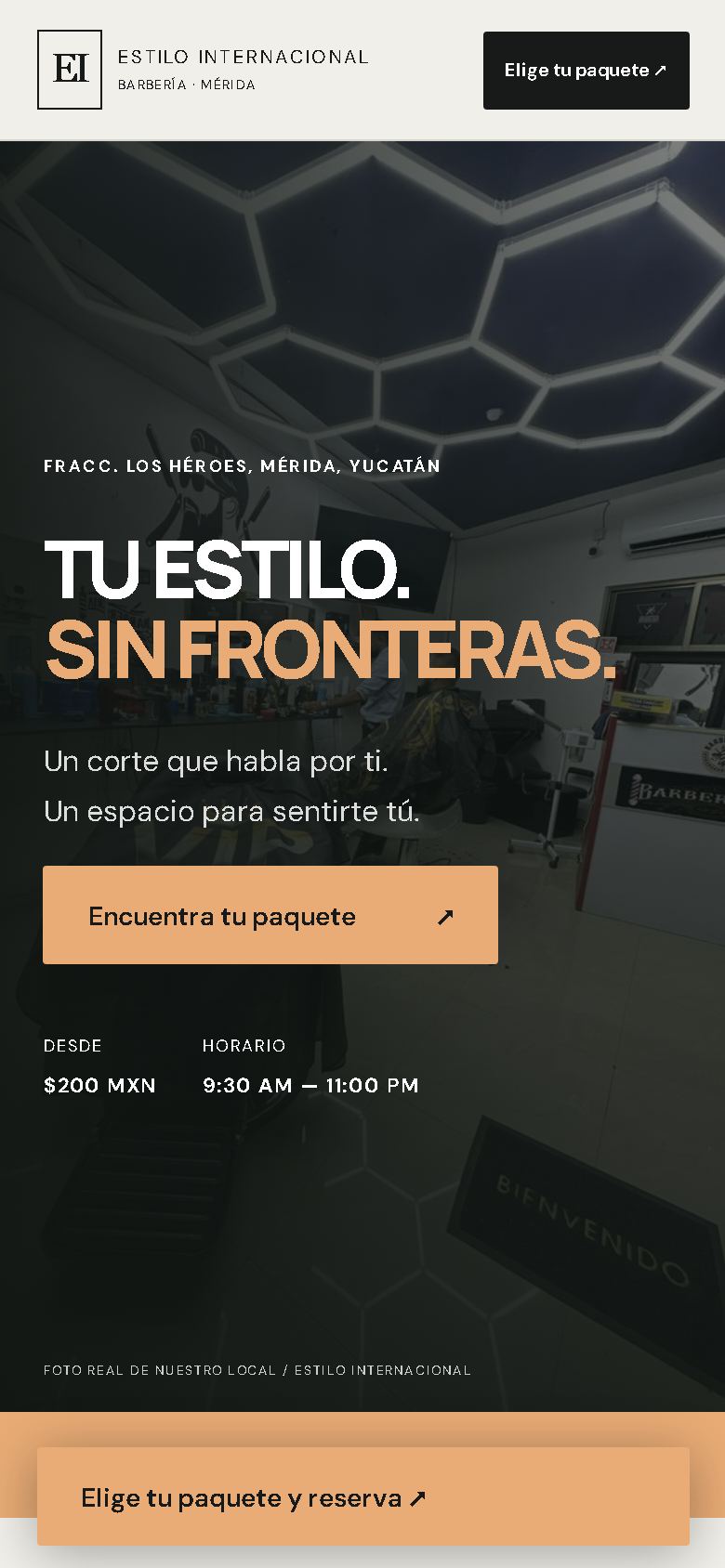 The barbershop's home page on a phone, in Spanish